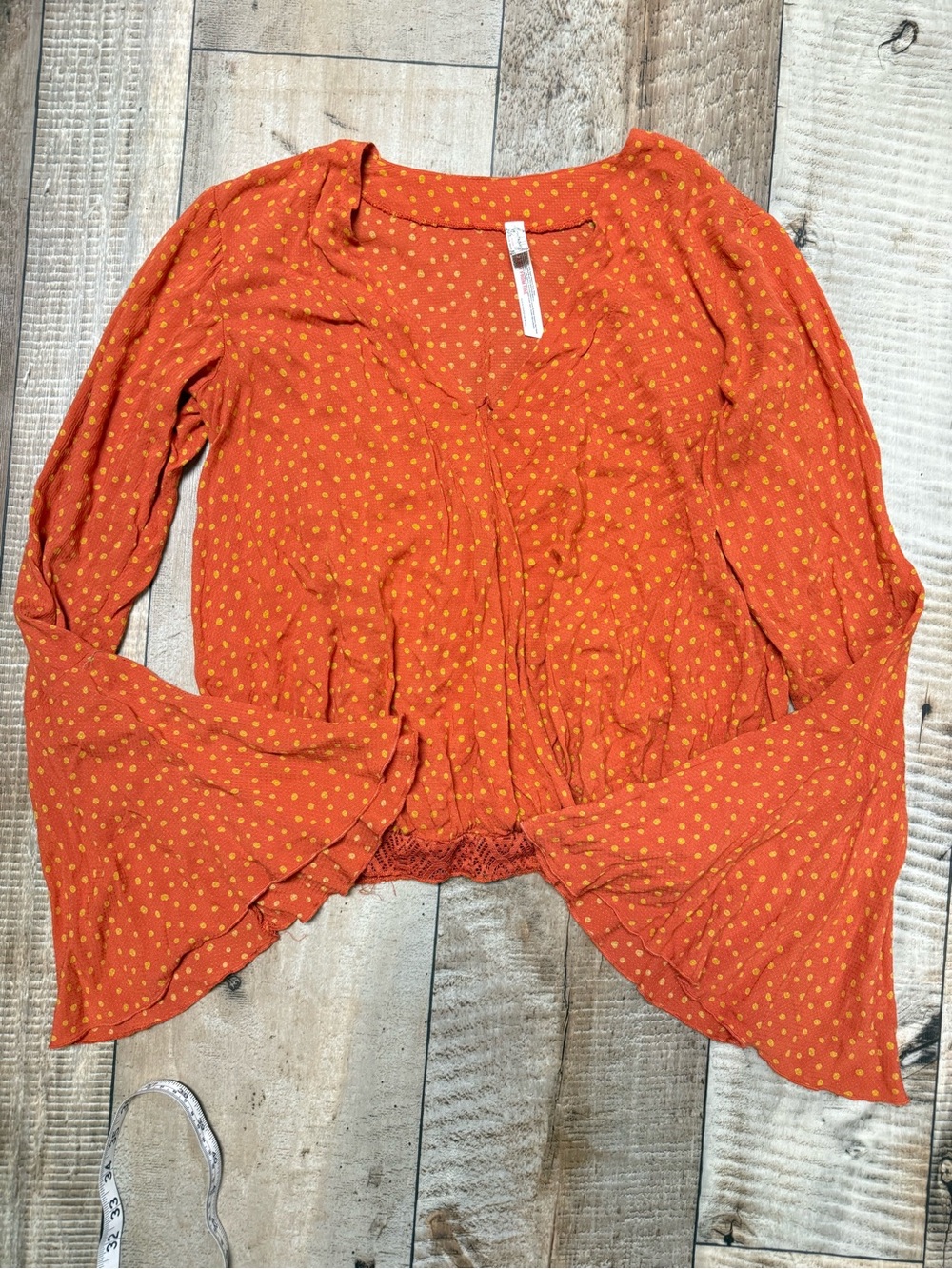Women’s Free People Orange Dot Long-Sleeve Top with bell sleeves